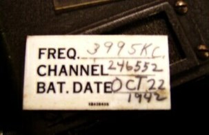 Closeup photo of Frequency, Channel, Battery Date card for BC-721 A radio