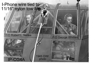 OWI 1945 photo of CG-4A nose showing wire-on-tow-line w/pilots.  This is photo for Varsity which also shows new safety glass in front of each pilot rather than the Plexiglas panels of original design