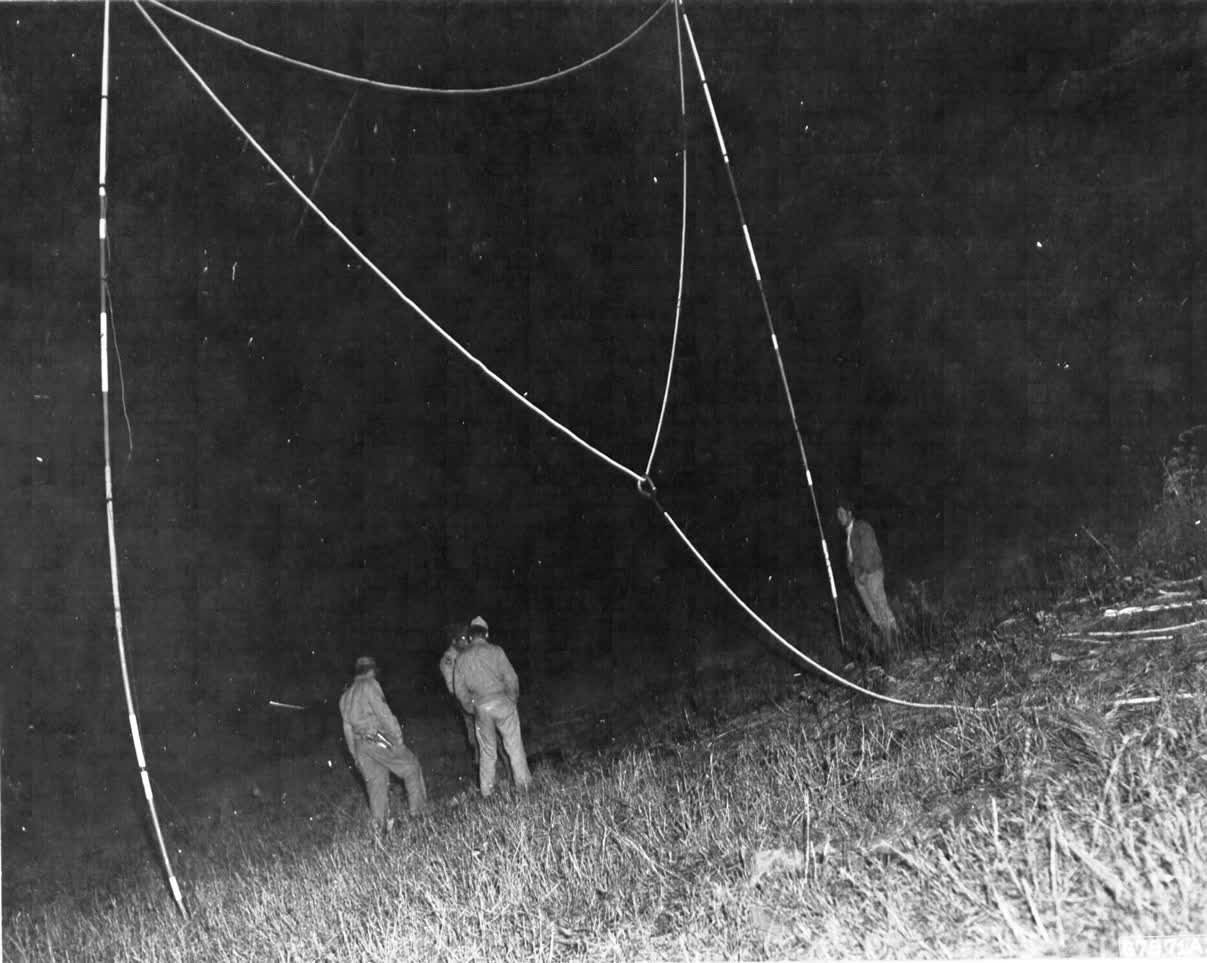 Poles with tow rope attached being set up for a night snatch Photo Courtesy of NWWIIGPC